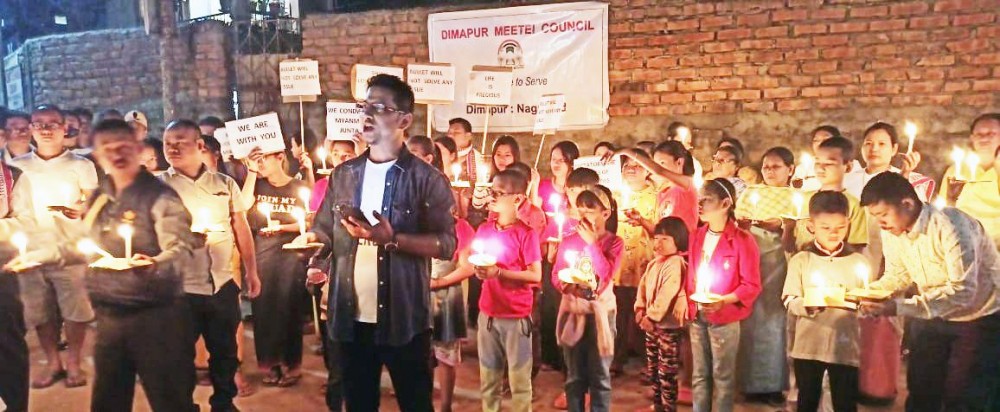 Participants during the candle light vigil for Myanmar organized by the Dimapur Meetei Council and Chümoukedima Meetei Apunba Lup in Dimapur on March 10.